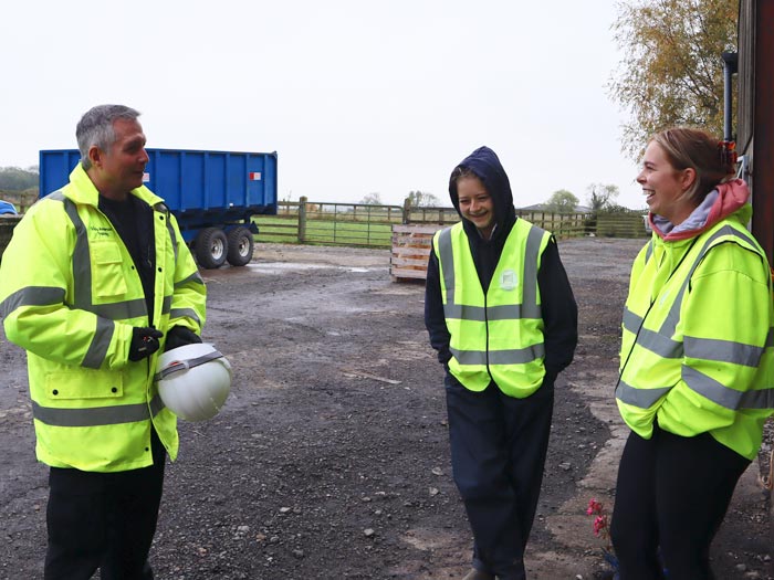 Young apprentices discuss training and development on a working farm.