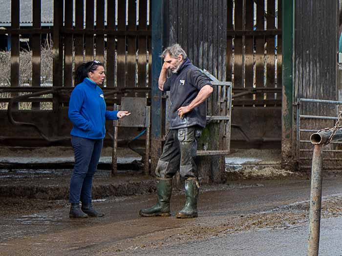 Karen Halton in discussion with one of her team on-farm. Picture: Ruth Downing.